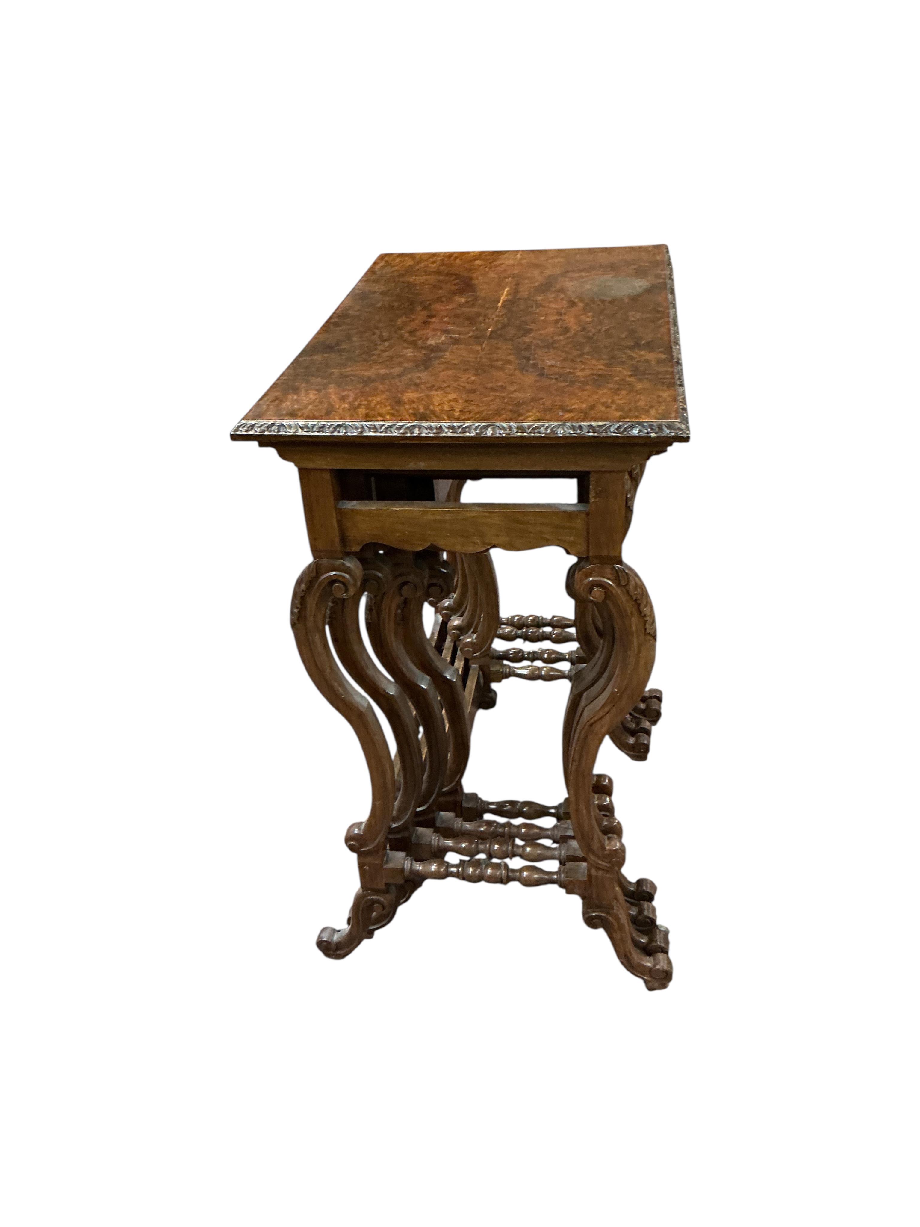 A quartetto of early 20th century rectangular burr walnut tables, width 57cm, depth 37cm, height 70cm